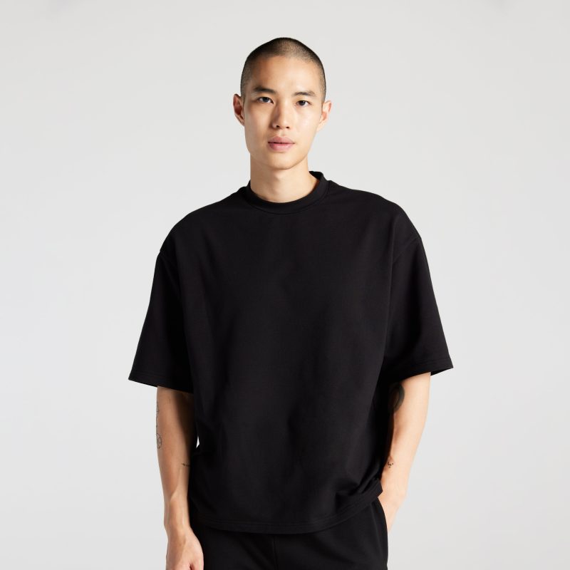 Black Cart | Front view of man in Kyoto Short Sleeve in Black