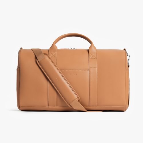 Saddle Tan (Vegan Leather) | Front view of Metro Carry-All Duffel in Saddle Tan